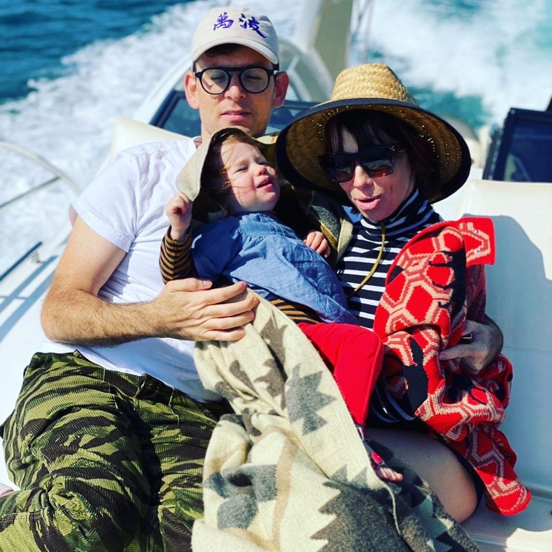 Moshe Kasher in vacation with his wife Natasha Leggero while holding their daughter.