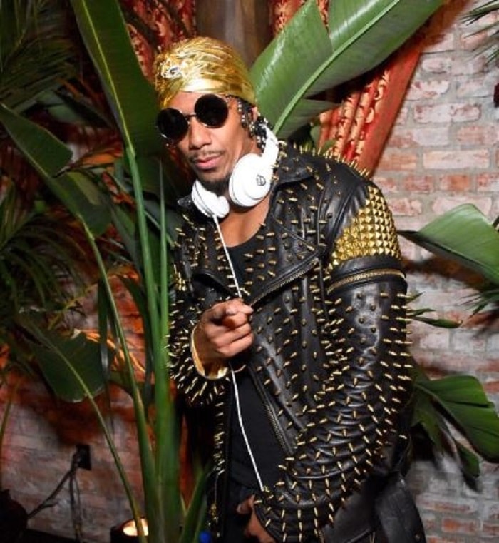 Nick Cannon in a funky golden turban