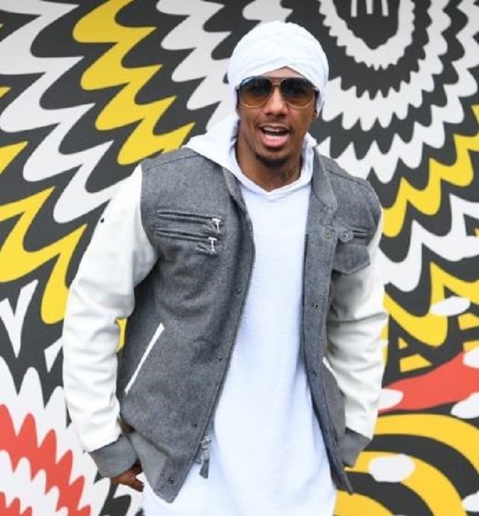 Nick Cannon in a white turban.