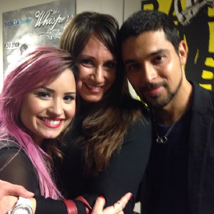 Amber with her sister Demi Lovato and her boyfriend (now ex) Wilmer Valderrama.