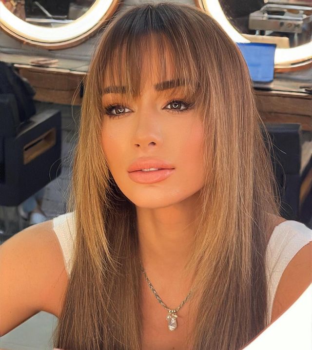 bru luccas wearing a white tee.
