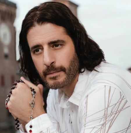 Jonathan Roumie is an American actor who became famous for playing Jesus in "The Chosen," a TV series funded by lots of people that tells the story of Jesus.