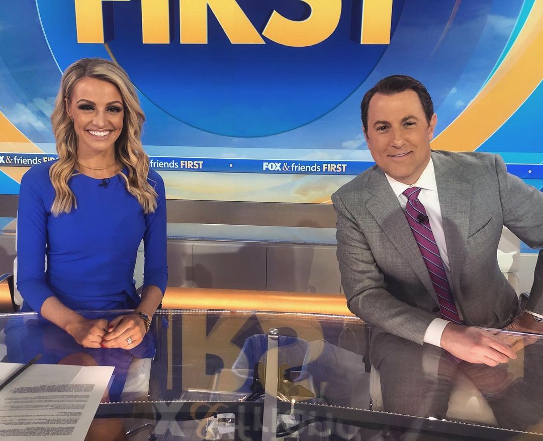 Carley Shimkus along with her co-host, Todd Piro. 