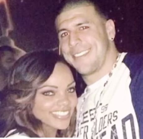 Aaron Hernandez and Shayanna Jenkins posing for a photo shoot.