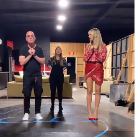 Howie Mandel dancing with his daughter, Jackie, and co-worker. 