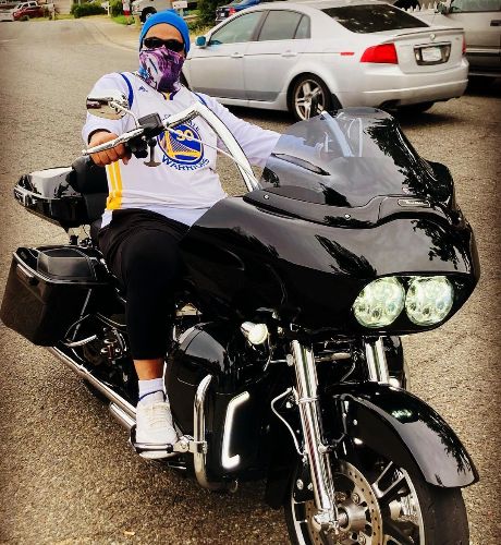 Sam Fatu riding his motor bike.