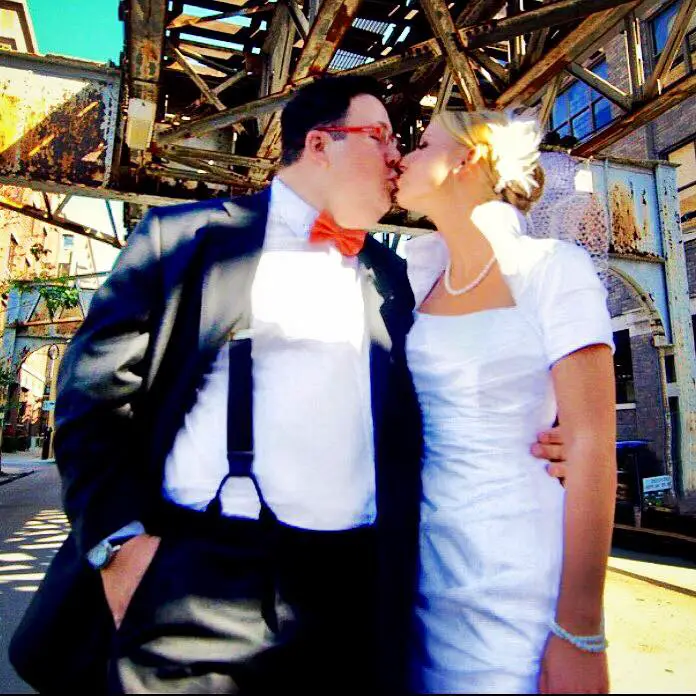 Allie Elliot and Graham Elliot posing for a photoshoot. 