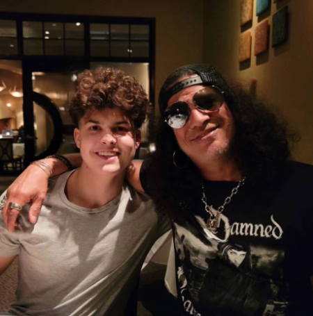 Perla Ferrar's ex-spouse Slash, whose real name is Saul Hudson, has had a remarkable and influential career in the music industry.