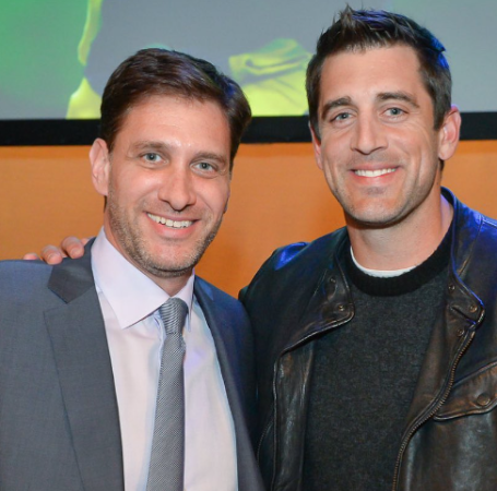 Mike Greenberg is with his friend.